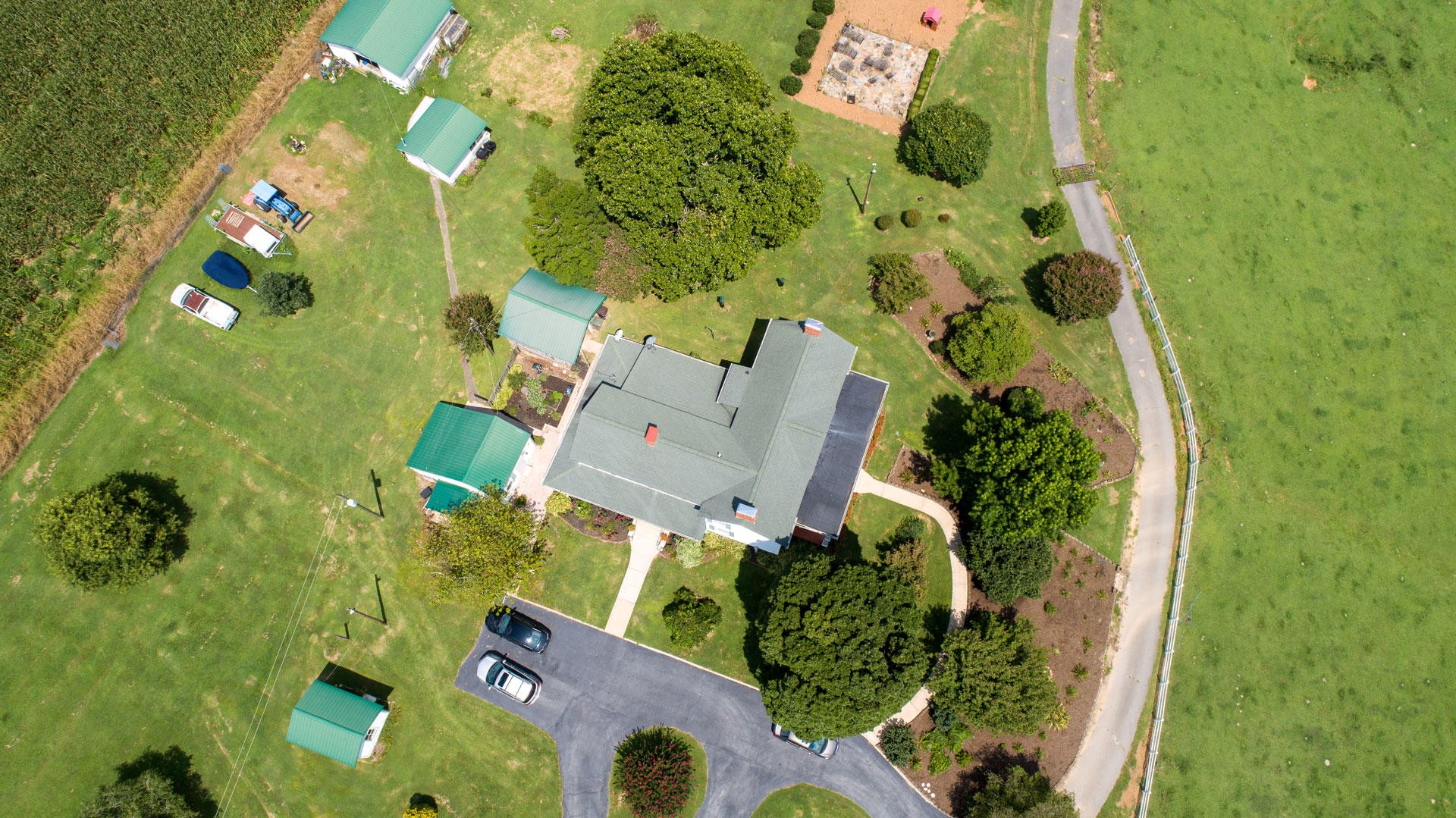 4965 Roberson Spring Road Loudon, TN 37774 - Photo 7 of 39 an aerial view of a house with a yard and garden view