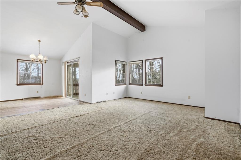 120 Grandview Drive Freeport, PA 16229 - Photo 14 of 40 a view of a big room with windows and chandelier fan