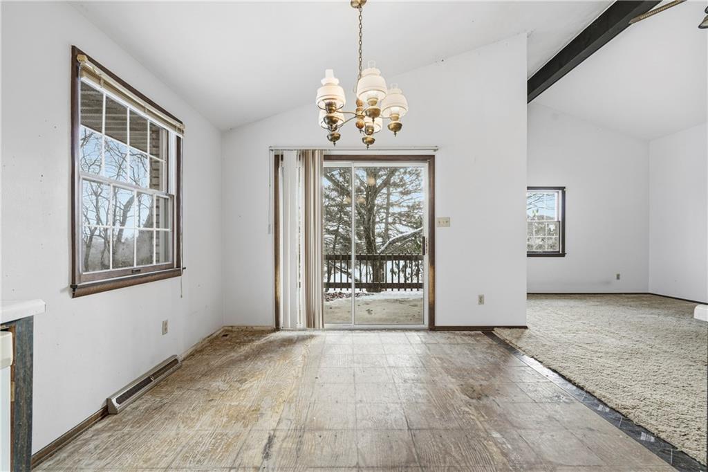 120 Grandview Drive Freeport, PA 16229 - Photo 18 of 40 an empty room with windows and chandelier