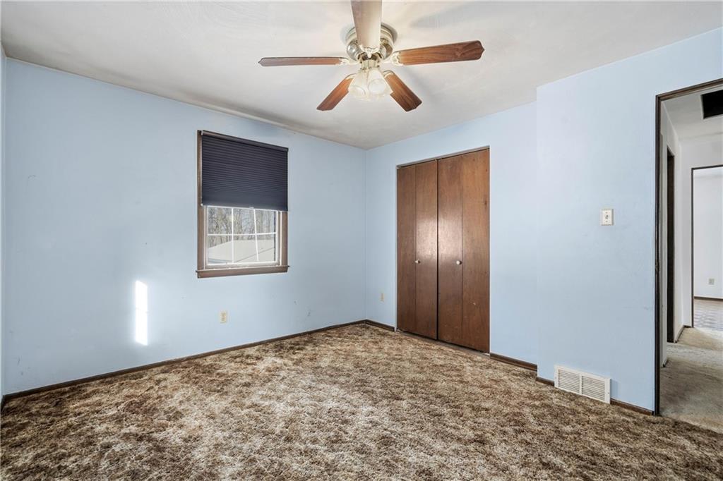 120 Grandview Drive Freeport, PA 16229 - Photo 33 of 40 a view of an empty room with window and chandelier fan