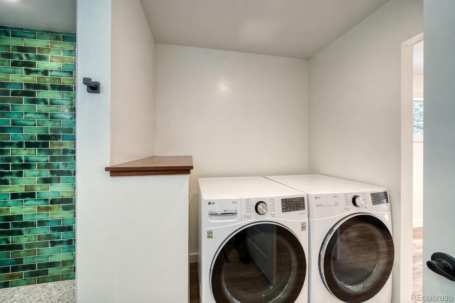 15351 Chimney Rock Road Nathrop, CO 81236 - Photo 11 of 48 a view of a storage & utility room with washer and dryer