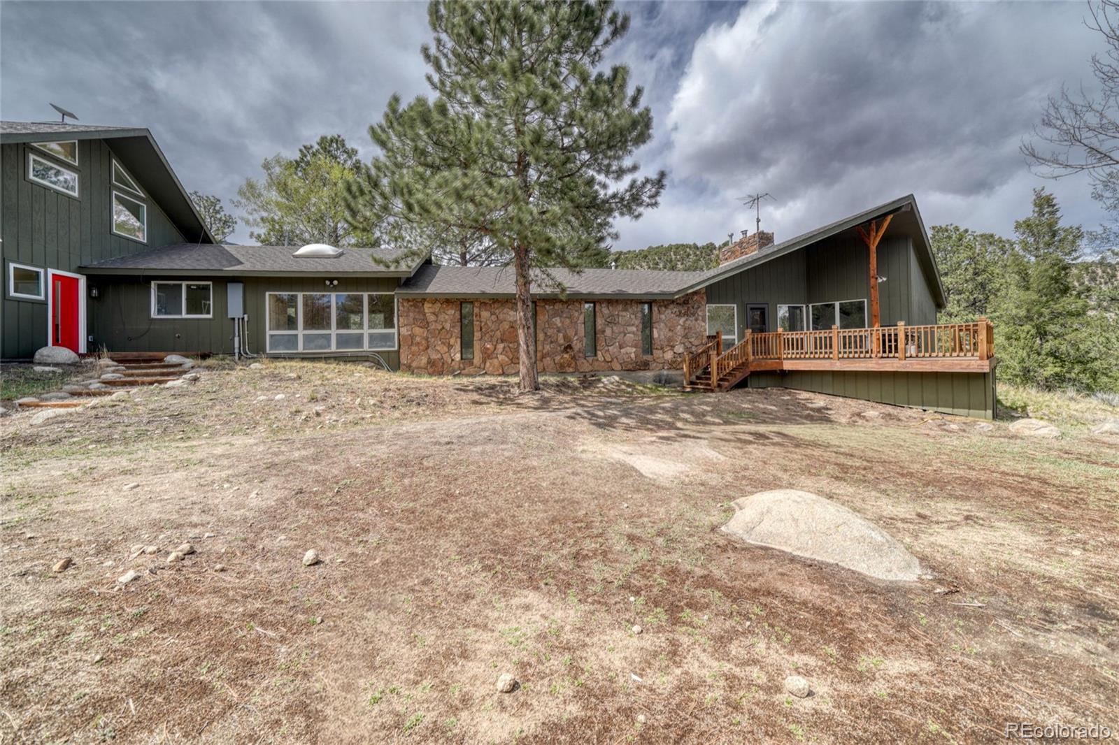 15351 Chimney Rock Road Nathrop, CO 81236 - Photo 36 of 48 a front view of a house with a yard