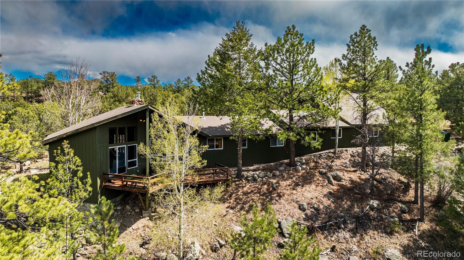 15351 Chimney Rock Road Nathrop, CO 81236 - Photo 40 of 48 a backyard of a house with lots of green space