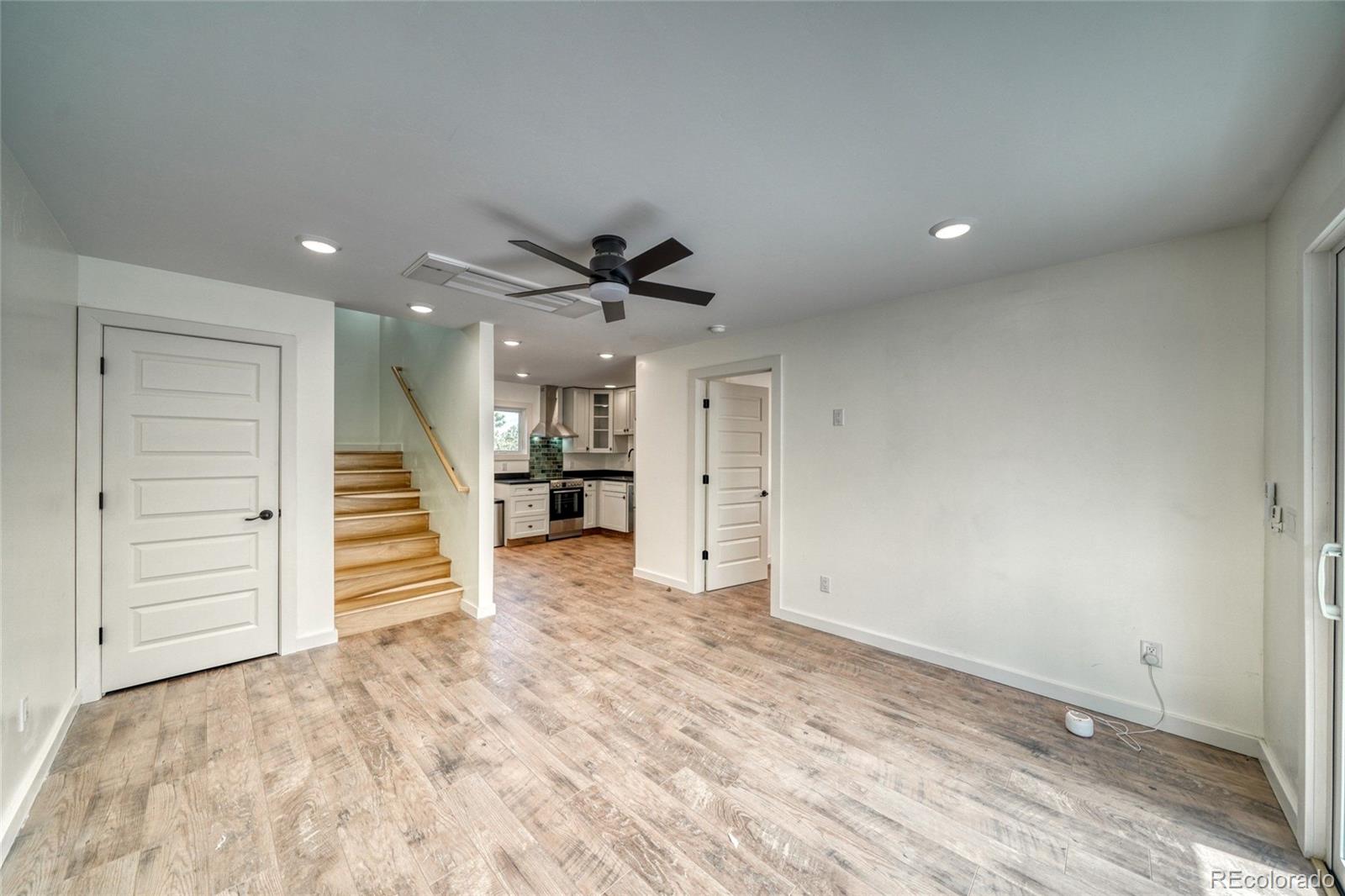 15351 Chimney Rock Road Nathrop, CO 81236 - Photo 5 of 48 an empty room with a bathroom and a ceiling fan