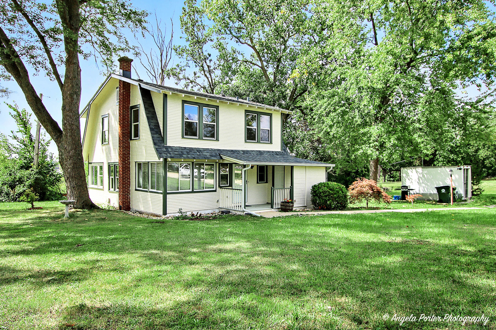 41028 North Ridge Circle Antioch, IL 60002 - Photo 1 of 29 a view of a house with a big yard and large trees