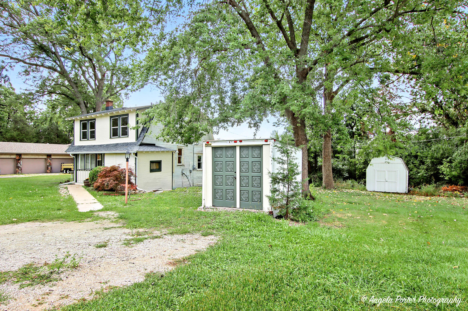41028 North Ridge Circle Antioch, IL 60002 - Photo 24 of 29 a view of a house with backyard porch and sitting area