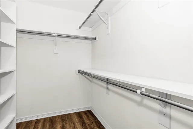 a view of a room with racks on the wall