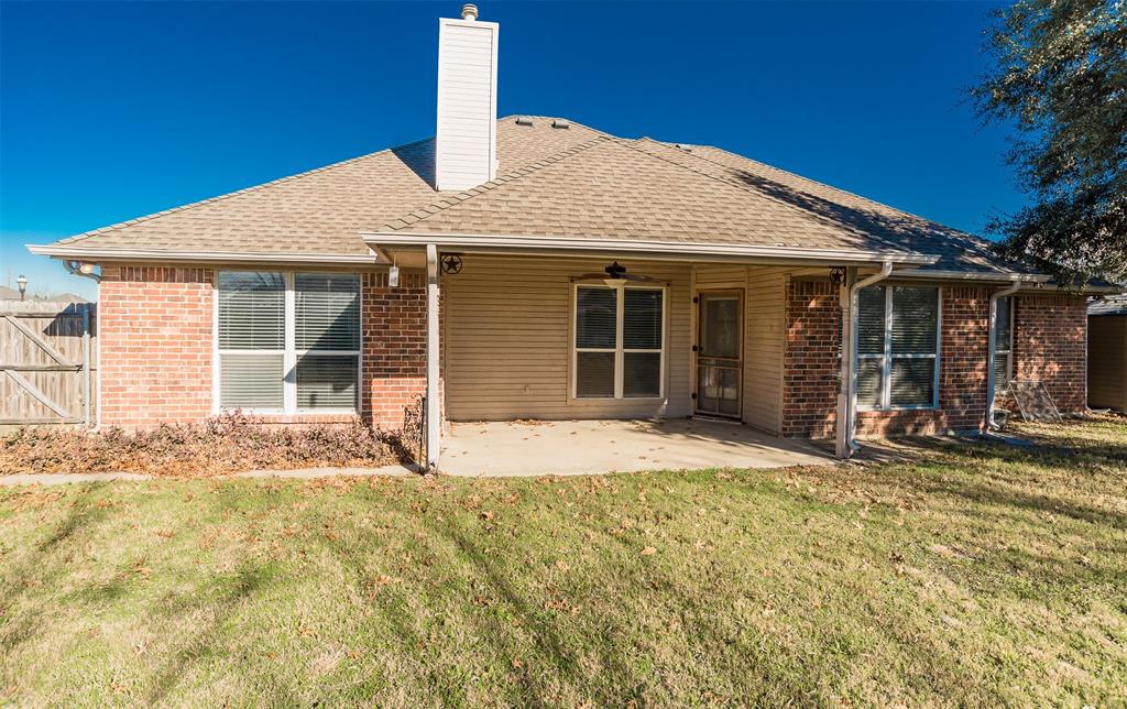 233 Cobblestone Circle Red Oak, TX 75154 - Photo 20 of 23 a house view with a garden space