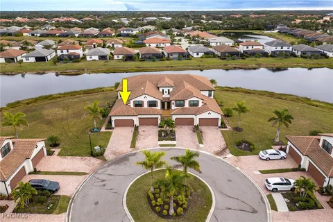 an aerial view of a house with a ocean view