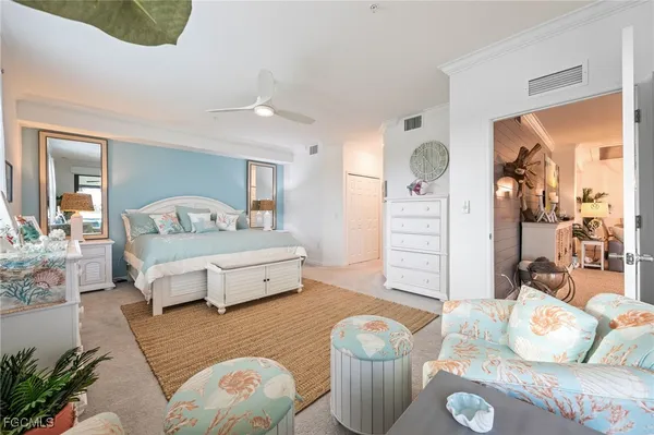 a bedroom with furniture and a couch