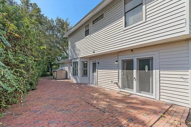 a view of a house with a yard and garage