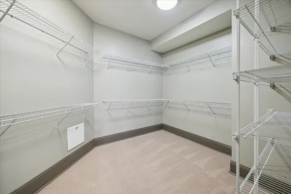 a view of a room with racks on the wall