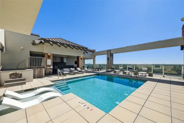 a view of kitchen with oven and stove