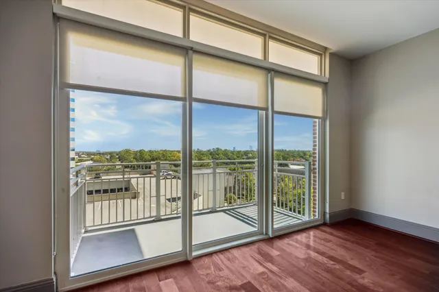 a view of a glass door with a glass windows