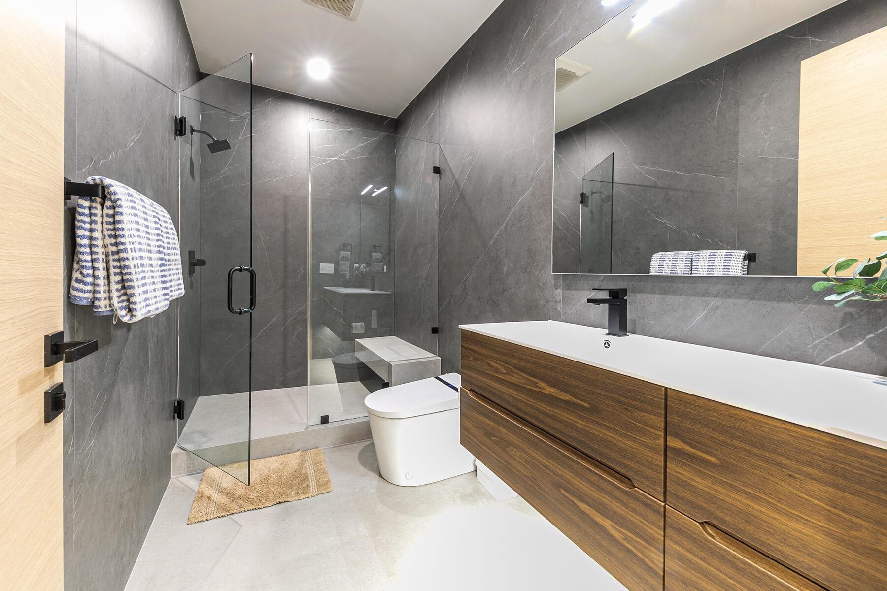 9287 Brae Road Truckee, CA 96161 - Photo 21 of 28 a bathroom with a sink toilet and shower