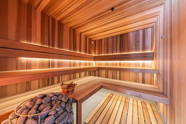 a view of a room with furniture and a window