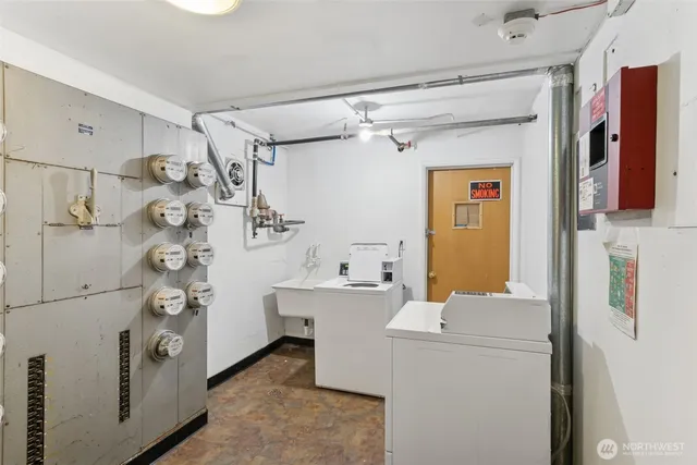 a view of a utility room with washer and dryer