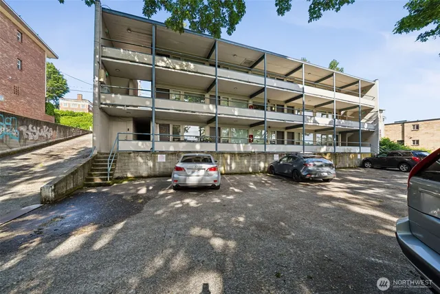 a view of a street with cars