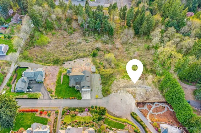 an aerial view of a house with a garden