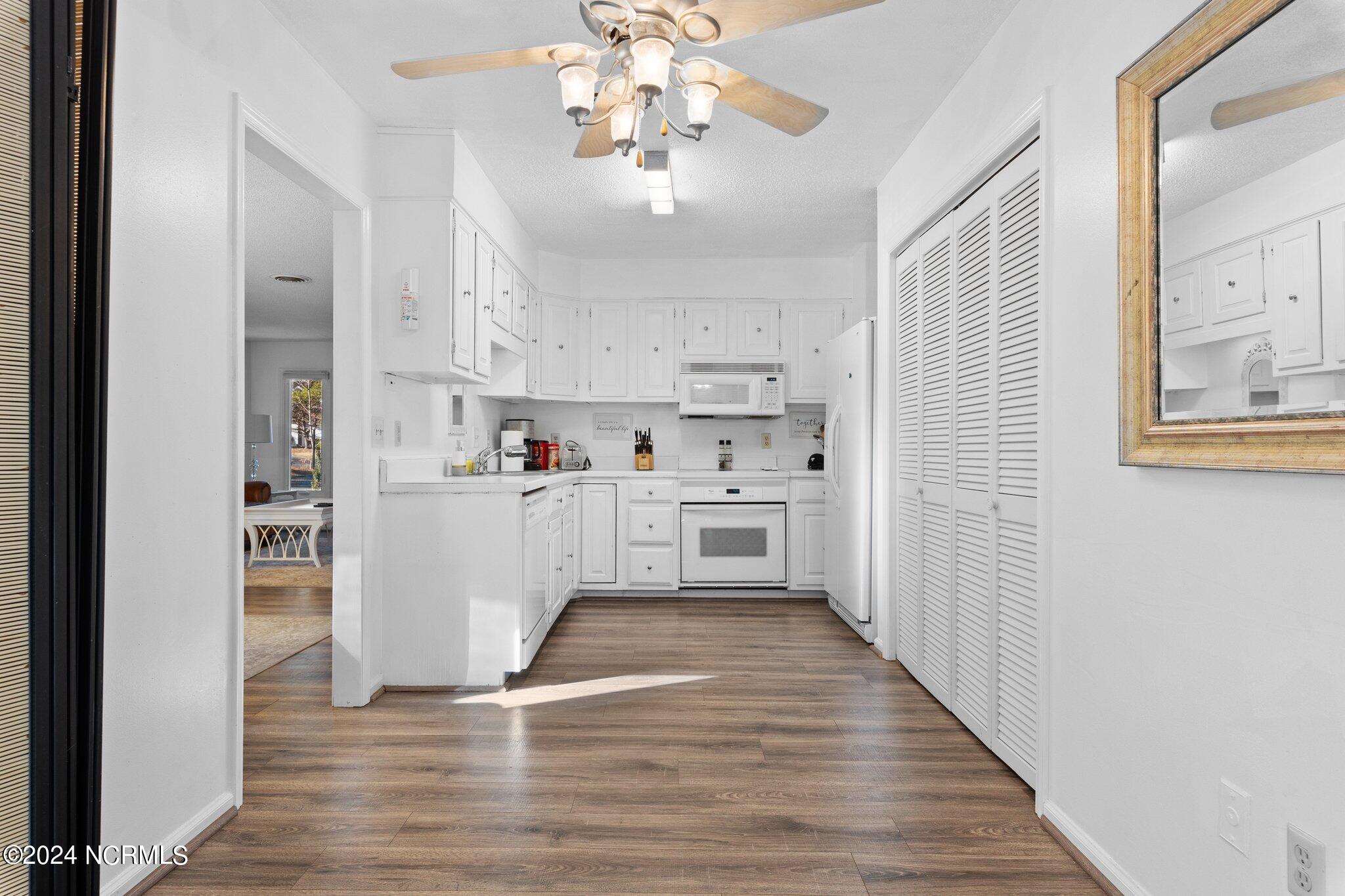 6 Canter Place Pinehurst, NC 28374 - Photo 9 of 29 Kitchen with Washer and Dryer Closet