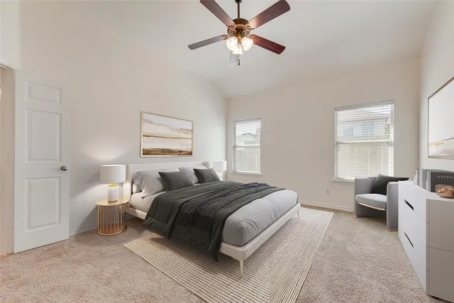 a bedroom with a bed and furniture