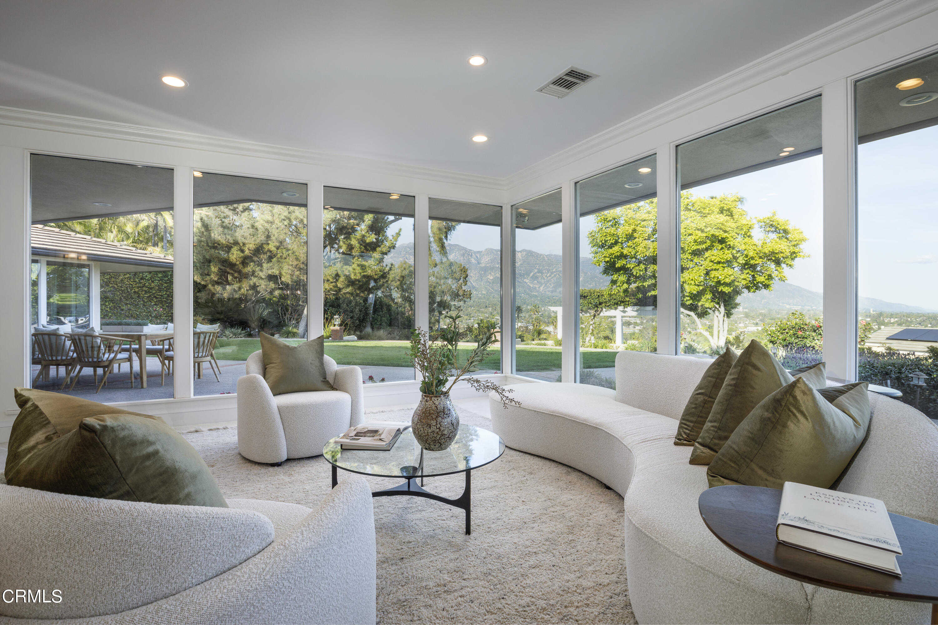1860 Braemar Road Pasadena, CA 91103 - Photo 2 of 5 a living room with furniture and a large window