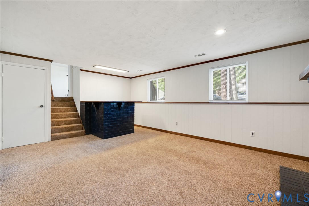 6513 Philbrook Road Richmond, VA 23234 - Photo 13 of 26 This versatile room features neutral carpeting, wh