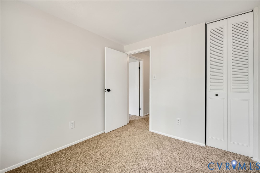 6513 Philbrook Road Richmond, VA 23234 - Photo 18 of 26 This room features carpeted flooring and light-col