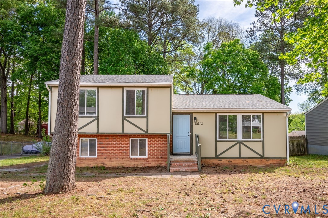 6513 Philbrook Road Richmond, VA 23234 - Photo 2 of 26 The property features a light-colored exterior wit