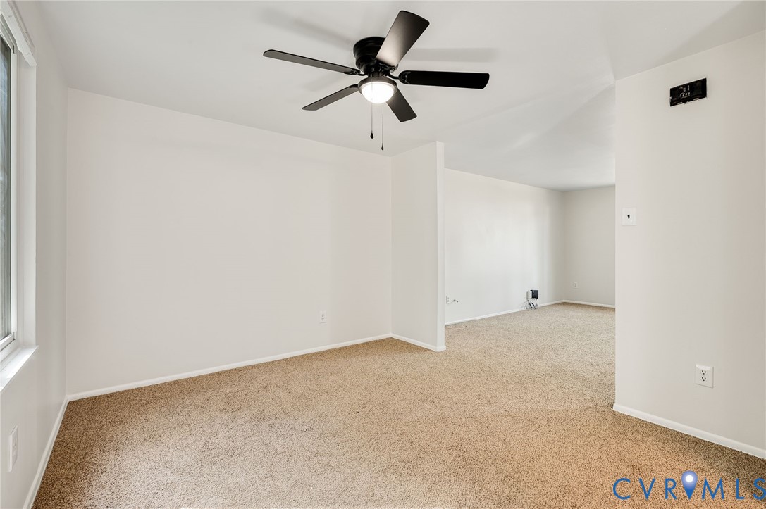 6513 Philbrook Road Richmond, VA 23234 - Photo 10 of 26 This spacious room features neutral-toned carpet,