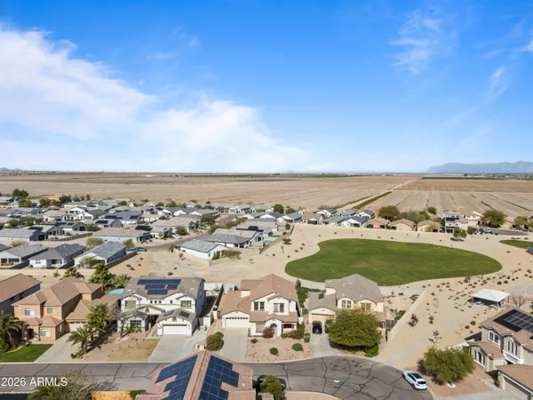 an aerial view of ocean with beach