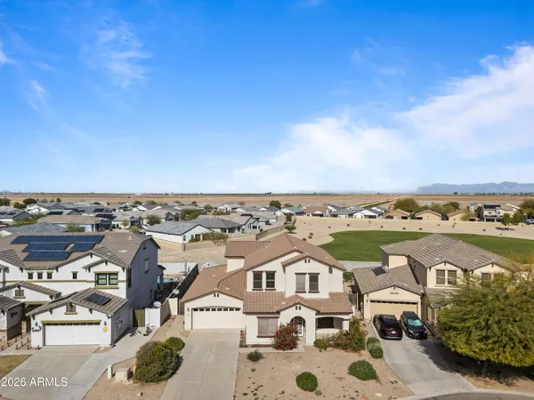 an aerial view of a highlighted house