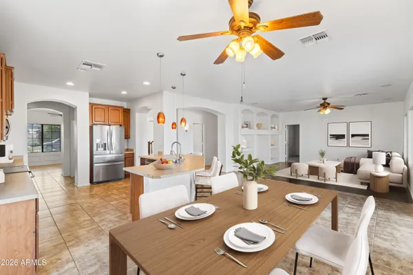 a view of a dining room with furniture