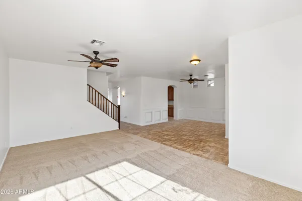 a view of empty room with windows