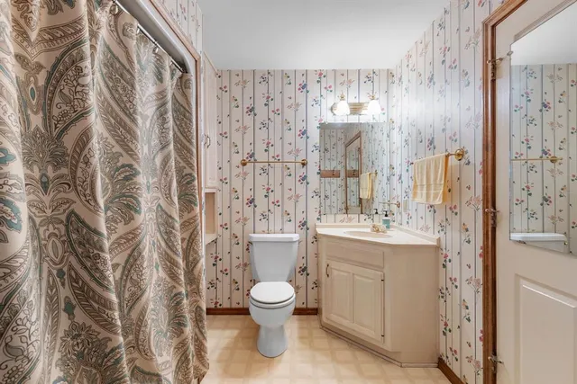 a view of lake with green space