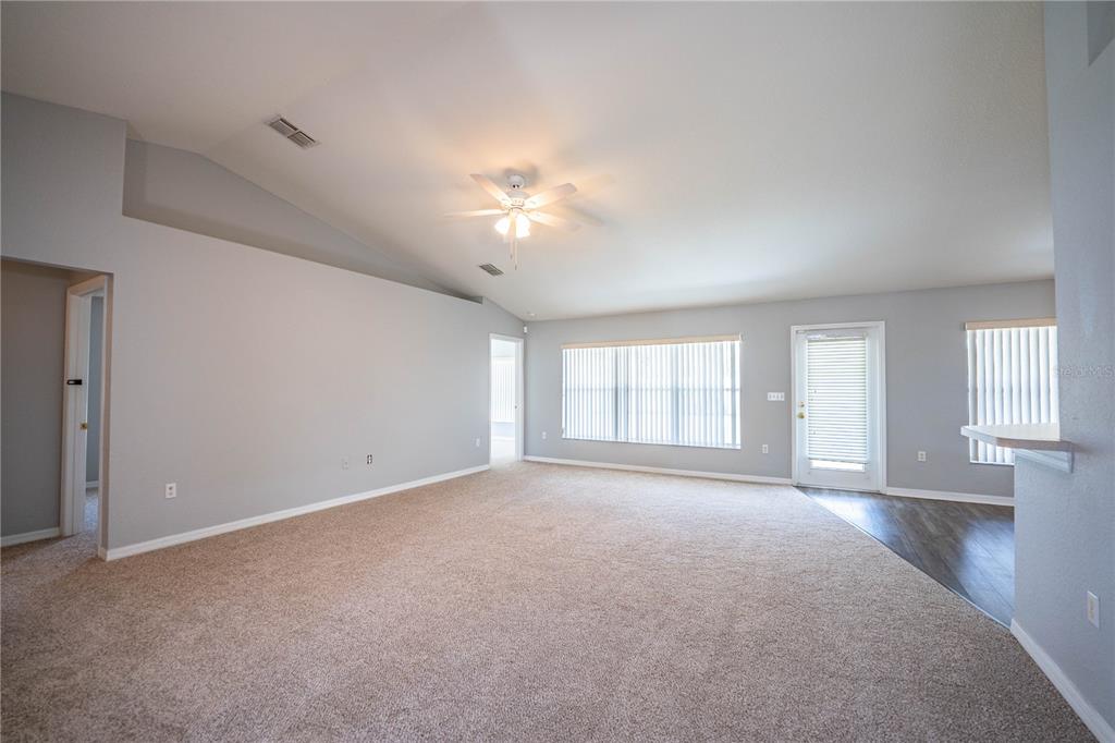 233 Towhee Road Winter Haven, FL 33881 - Photo 11 of 87 a view of a room with a ceiling fan and window