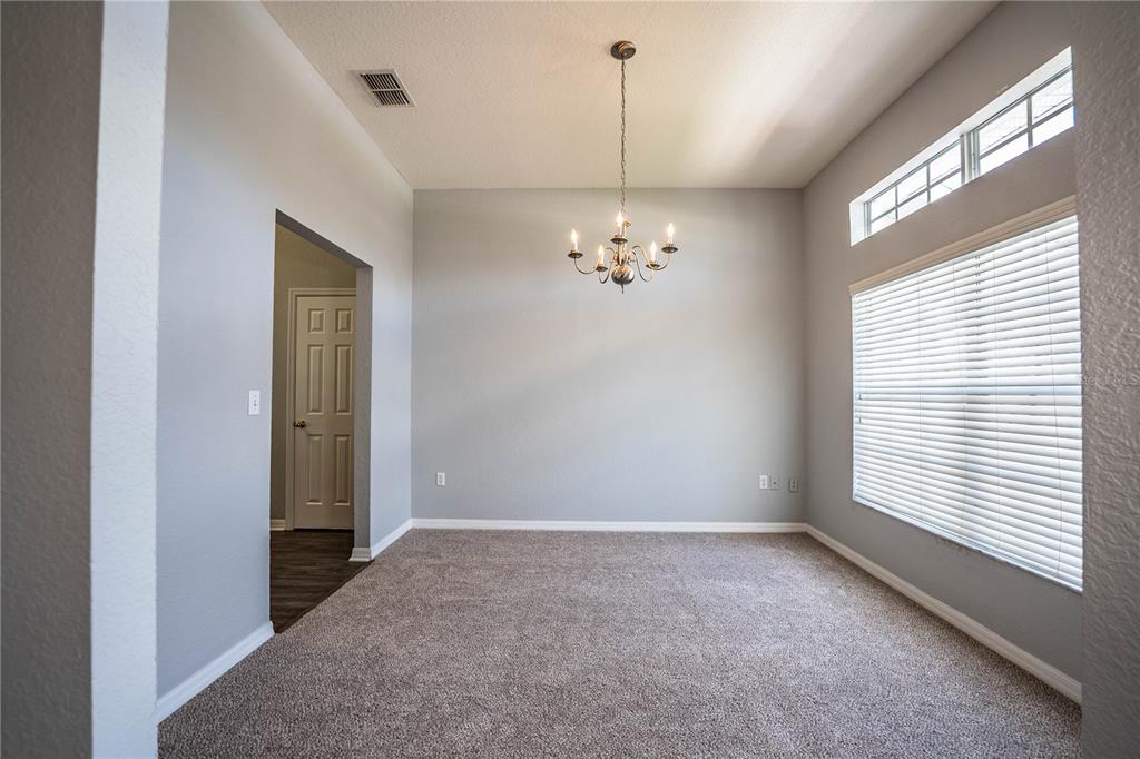 233 Towhee Road Winter Haven, FL 33881 - Photo 33 of 87 a view of an empty room with a window