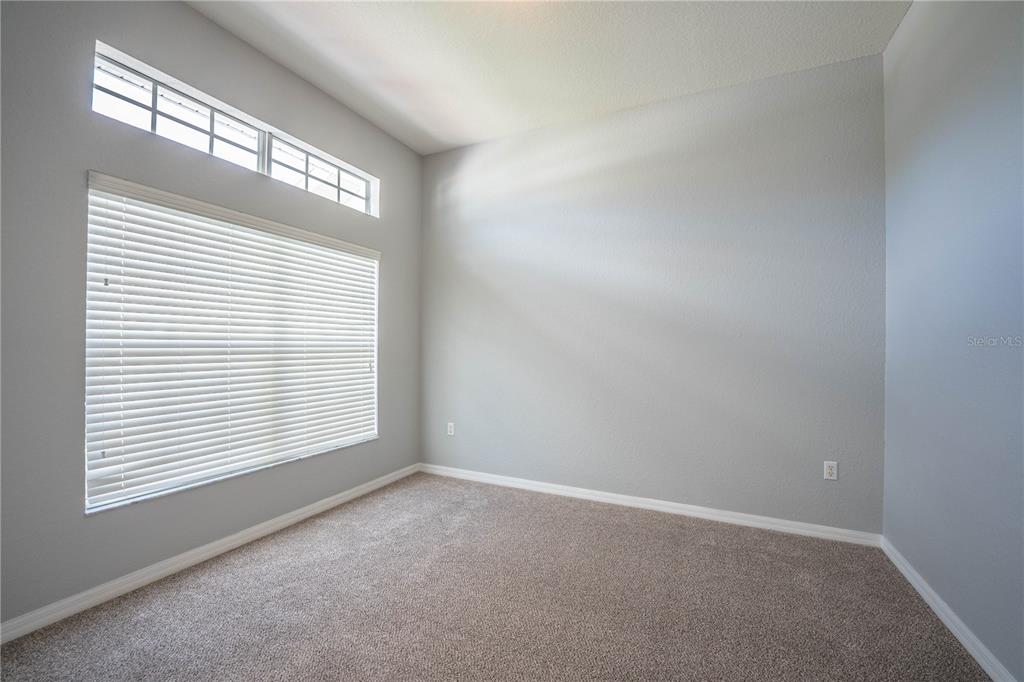 233 Towhee Road Winter Haven, FL 33881 - Photo 36 of 87 an empty room with a window