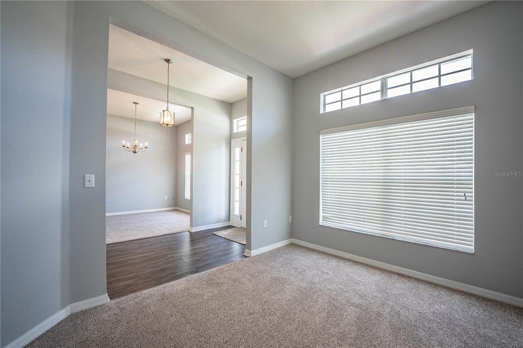 233 Towhee Road Winter Haven, FL 33881 - Photo 37 of 87 a view of an empty room with a window and a bathroom