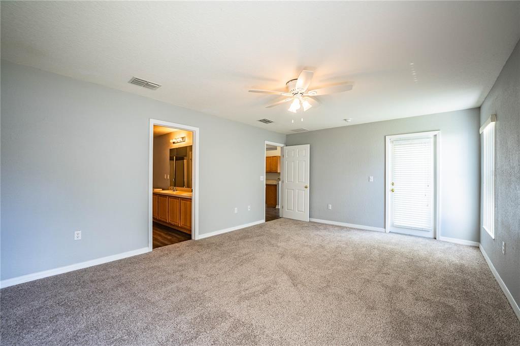 233 Towhee Road Winter Haven, FL 33881 - Photo 40 of 87 a view of an empty room with a window