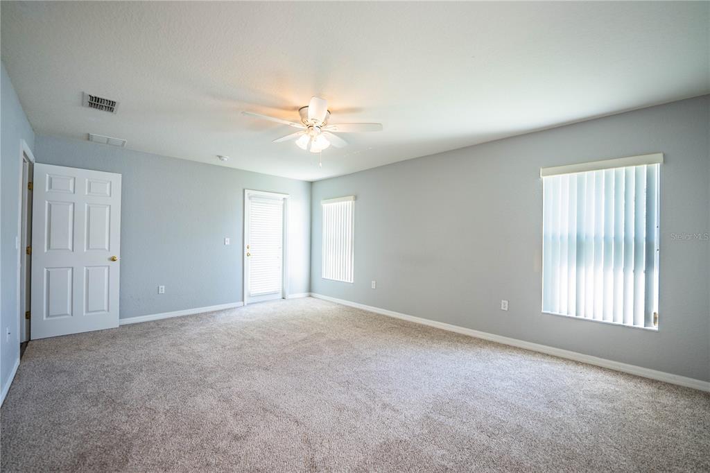 233 Towhee Road Winter Haven, FL 33881 - Photo 42 of 87 a view of an empty room with a window