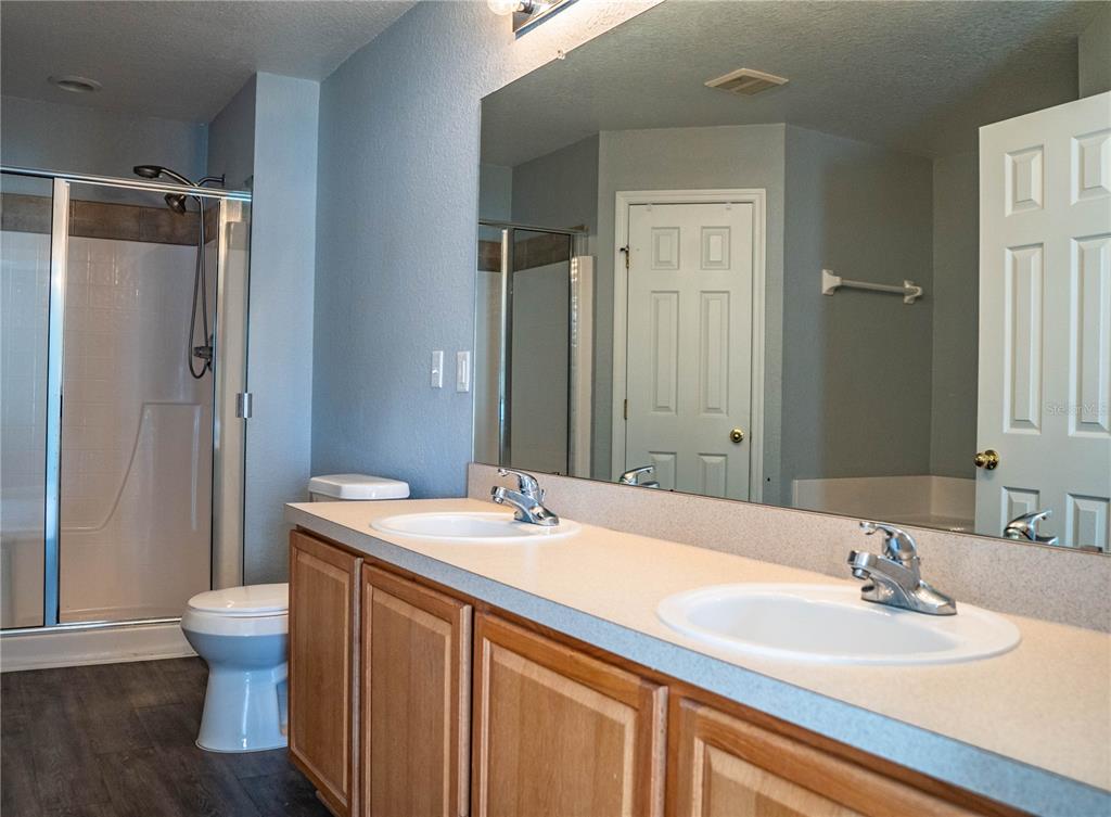 233 Towhee Road Winter Haven, FL 33881 - Photo 45 of 87 a bathroom with a sink a toilet and shower