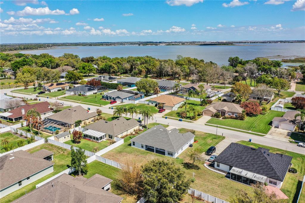 233 Towhee Road Winter Haven, FL 33881 - Photo 80 of 87 an aerial view of residential houses with outdoor space