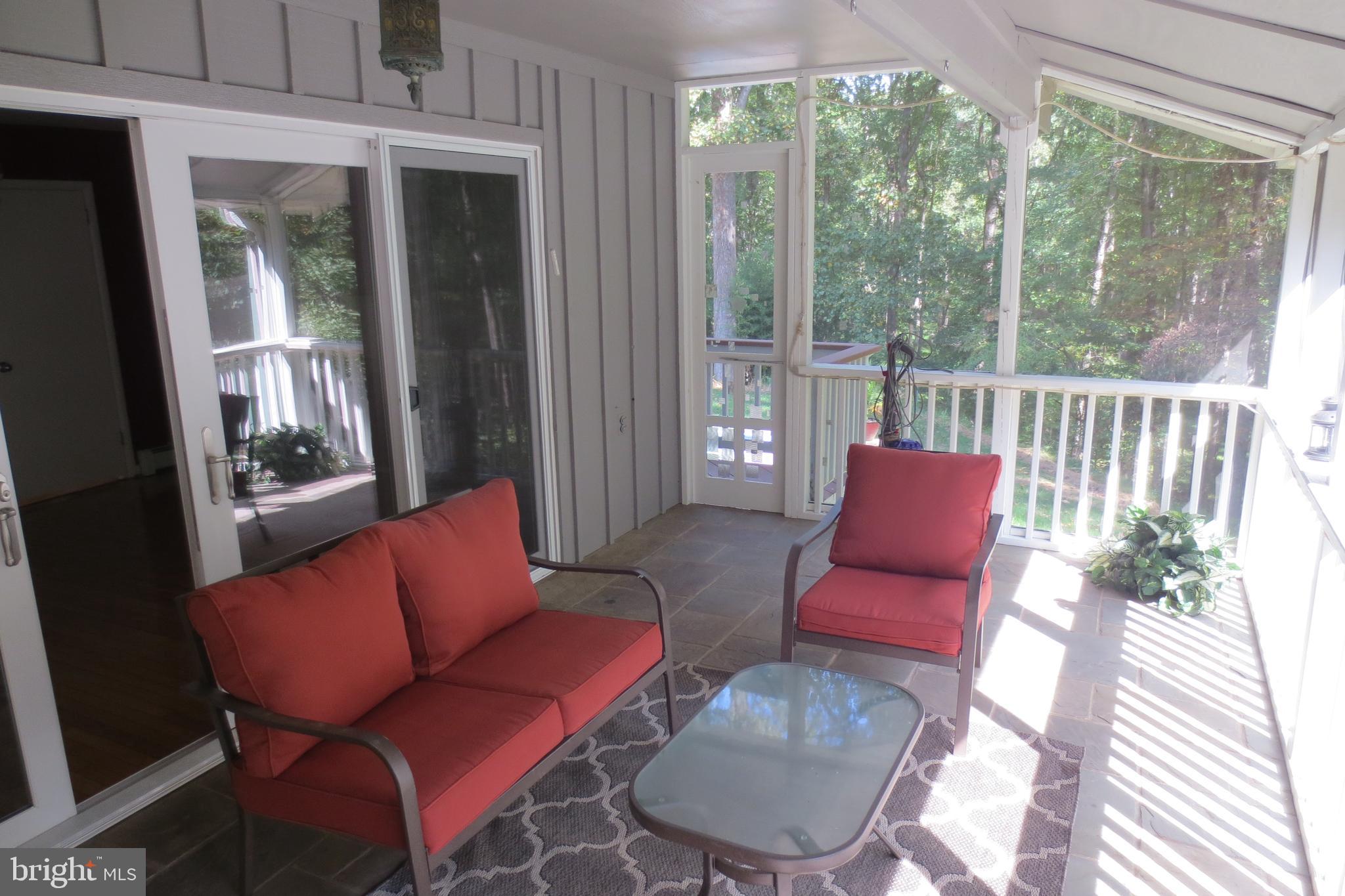14701 Poplar Hill Road Germantown, MD 20874 - Photo 39 of 108 Enclosed Back Deck-2 From Dining Room