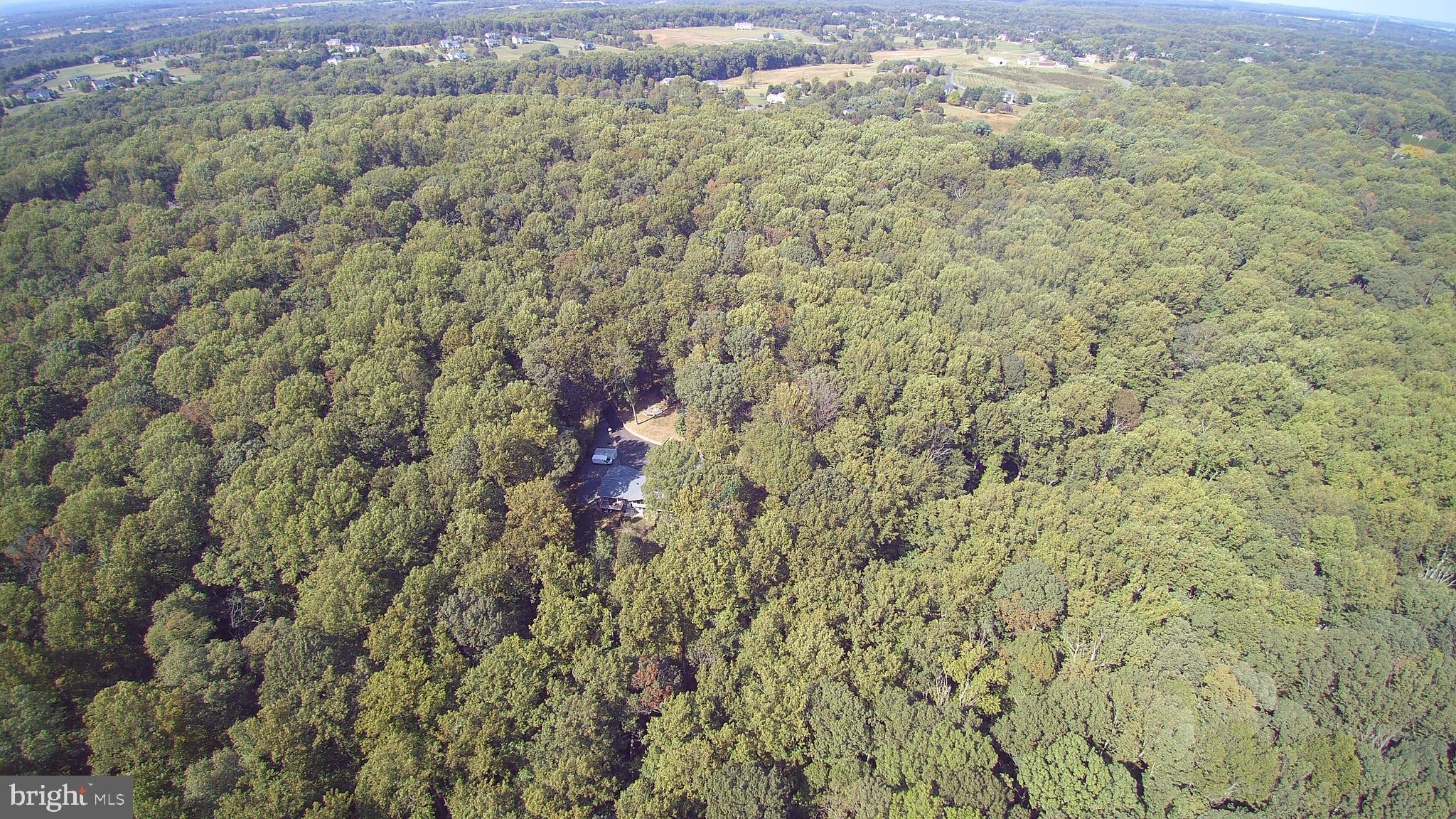 Aerial View of Property and Acreage
