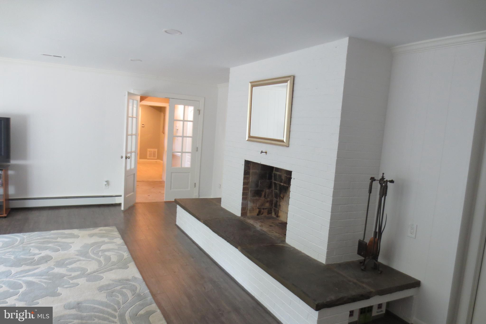 14701 Poplar Hill Road Germantown, MD 20874 - Photo 69 of 108 Fireplace in Lower Level Rec Room