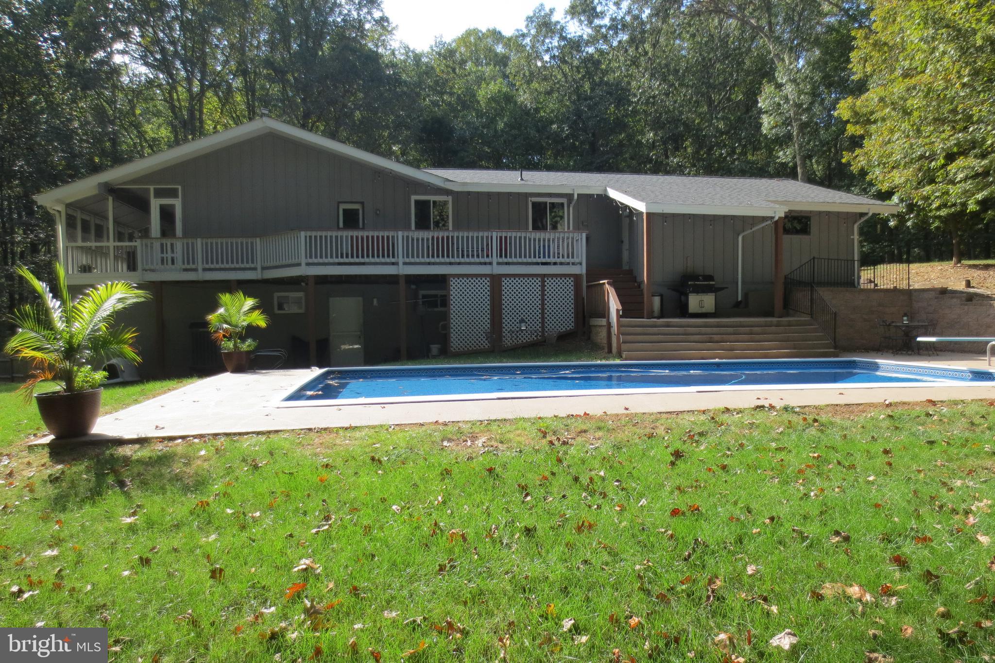 14701 Poplar Hill Road Germantown, MD 20874 - Photo 98 of 108 Side View of Pool and Side Deck From Kitchen