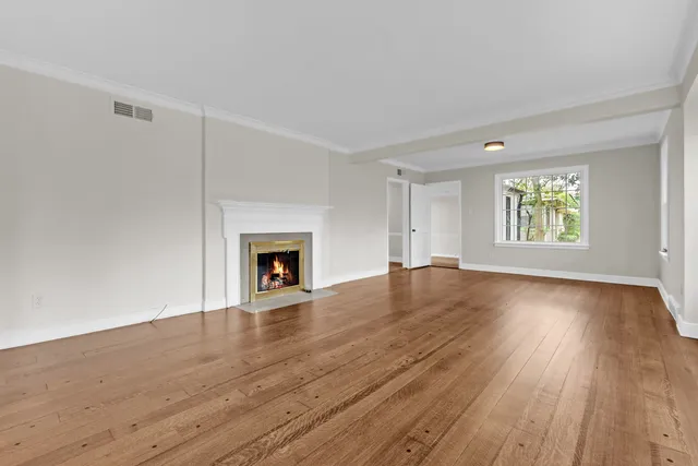 wooden floor with white walls