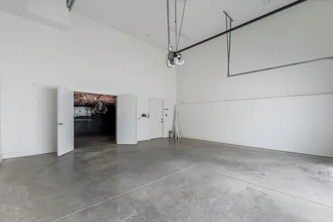 a view of an empty room with closet
