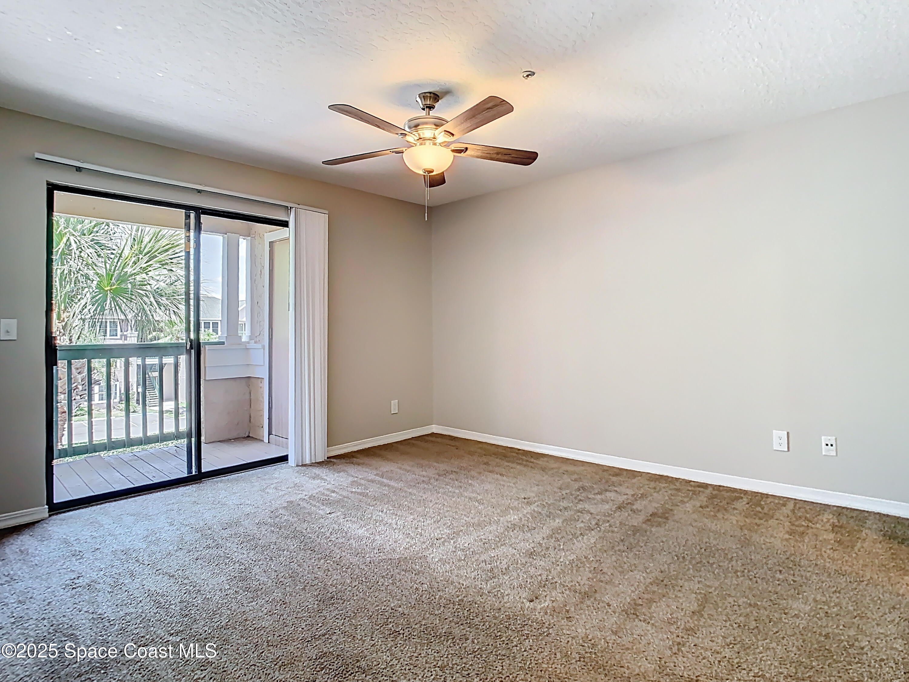 7667 North Wickham Road, Unit 721 Melbourne, FL 32940 - Photo 12 of 32 Large bedroom